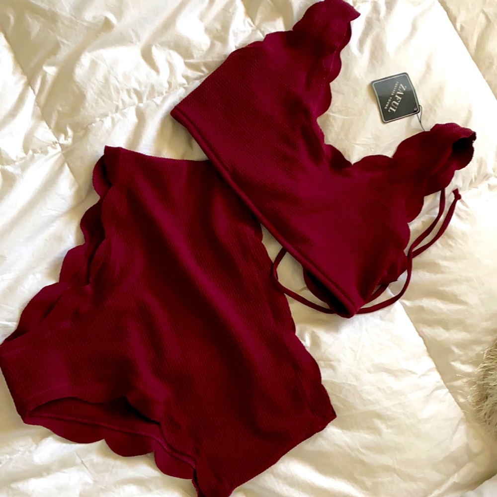 Burgundy high waisted bathing suite. Ties on back.